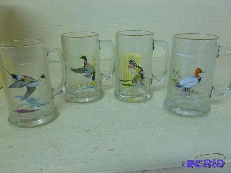 lot 78 image: A set of four Ned Smith gold plated glass wat...