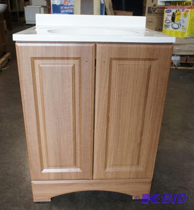 lot 14 image: Glacier Bay Vanity Sink Combo. Dimensions 18...