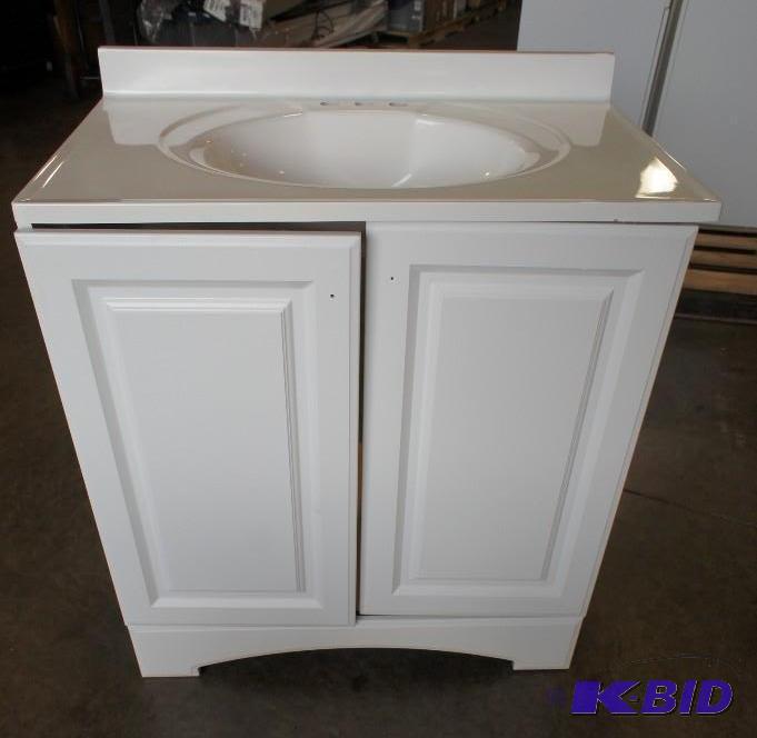 lot 3 image: Glacier bay vanity combo sink. Dimensions 18...
