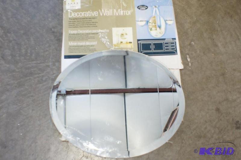 lot 31 image: Aura Oval Decorative Wall Mirror. Please see ...