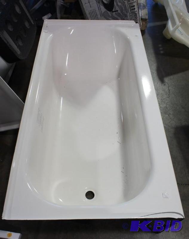 lot 43 image: Bath tub  30.25 x 60"  Small dent on l...
