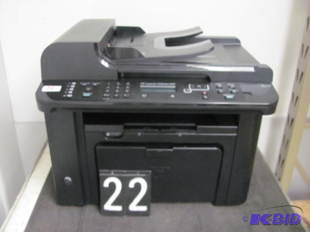lot 22 image: HP laserjet pro M1536 printer. This unit has ...