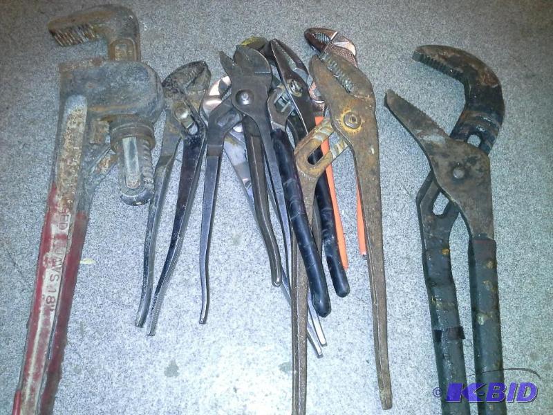 Channels locks and pipe wrench