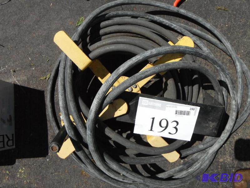 lot 193 image: Black Hose with Holder...