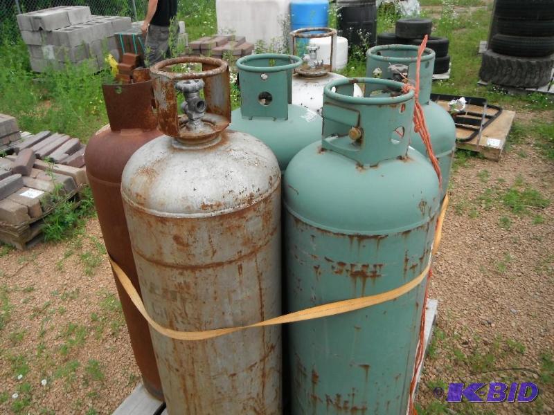 6 Propane cans...