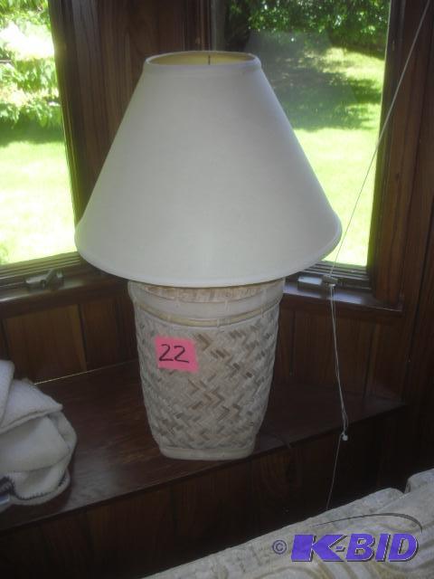 Wicker Basket type of lamp. 36 in h x 21 in d...
