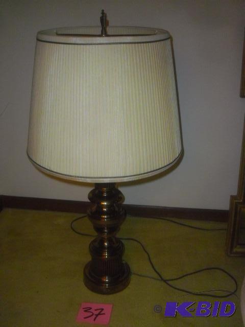 Nice table lamp.. Brass base and pleated shad...