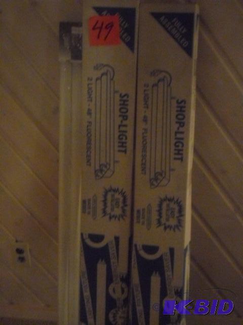 2, 48 in shop lights, new in boxes. 2 fluores...