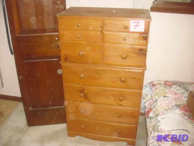 nice light fir dresser.8 drawer, 26in x 15 in...