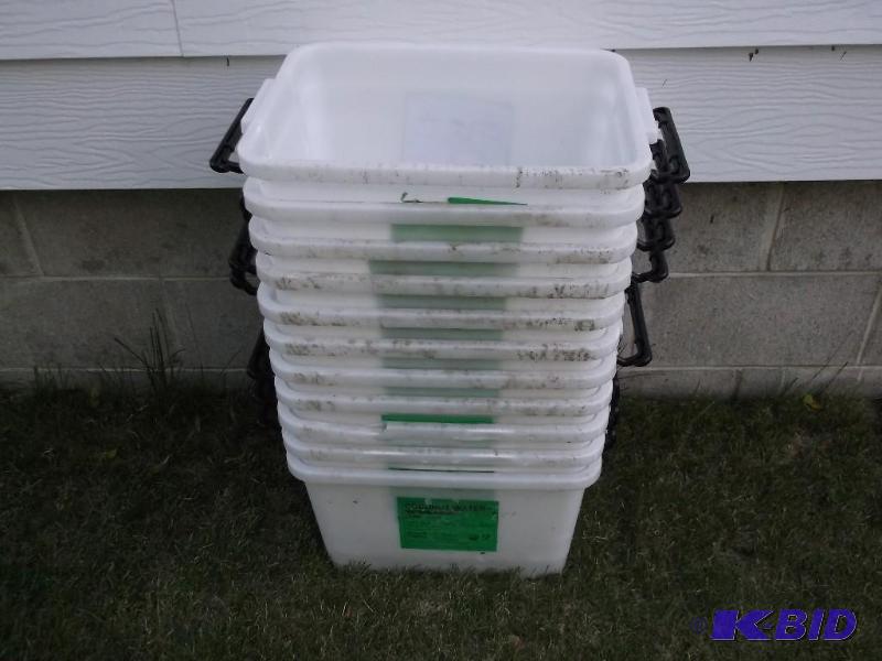 Lot with 11 food grade storage bins....