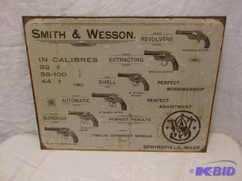 Smith &amp Wesson metal sign measuring 16&qu...