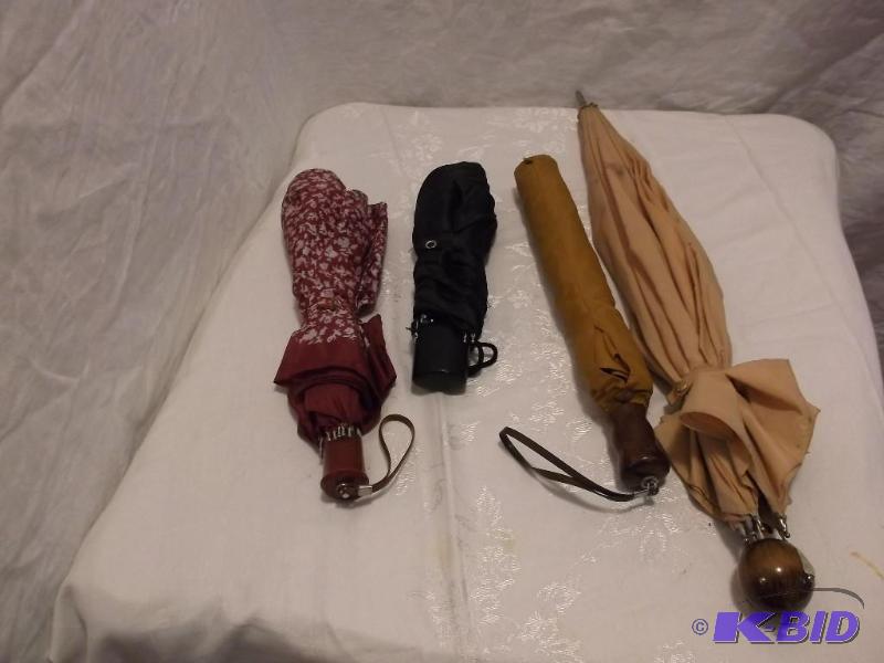 Nice lot with 4 umbrellas all appear in good...