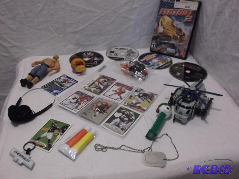 Lot with Play Station games,Sports cards,Tran...