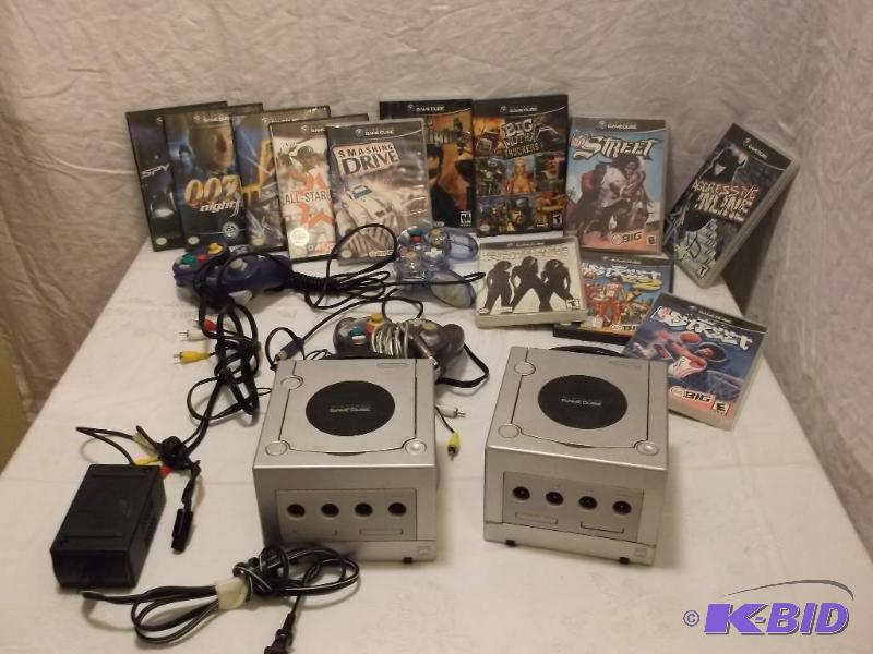 2 Nintendo Game Cube with 12 games &amp remo...