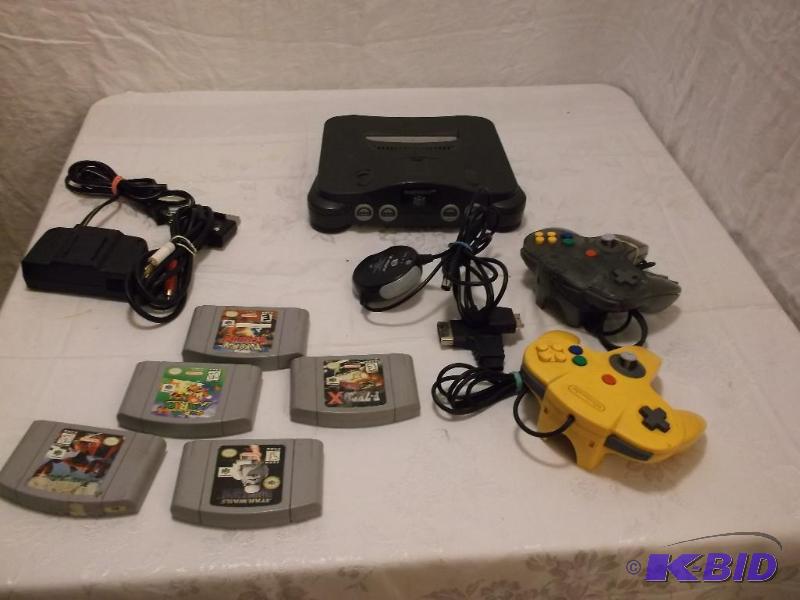 Nintendo system with remotes &amp games appe...