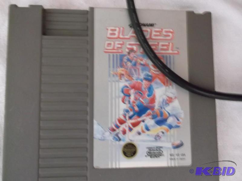 Nintendo Auction Set with gun,two controls &a...