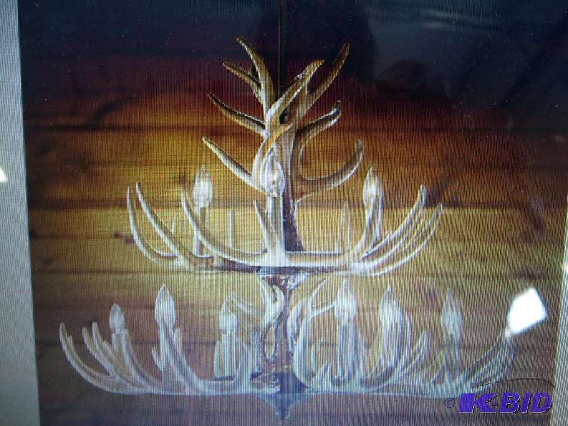 lot 22 image: Castle Creek 9-Light Antler Chandelier. New i...