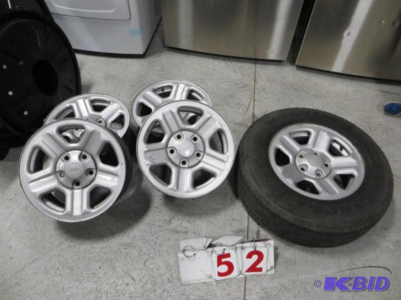 lot 52 image: Lot of 5 Jeep Rims - one with tire- Wrangler ...