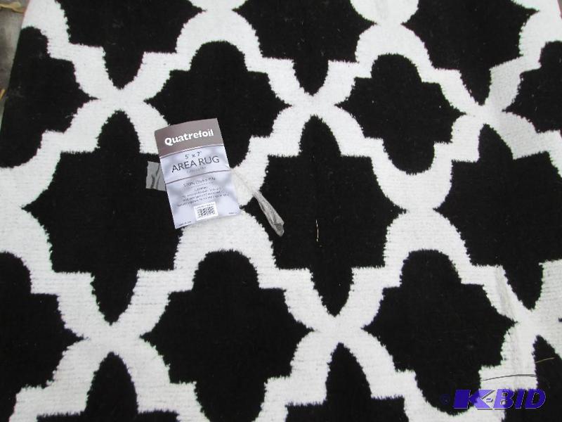 lot 1 image: 5 x 7 foot area rug  ...