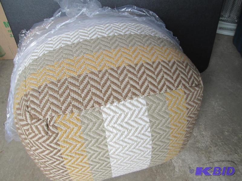 lot 10 image: New ottoman trendy stuffed like a firm pillow...