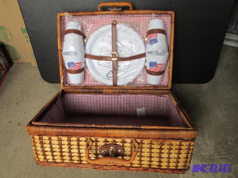 lot 11 image: Nice wicker picnic basket with plastic ware...