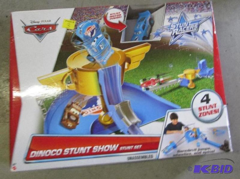 lot 126 image: Disney Pixar Cars, Dinoco stunt show unassemb...