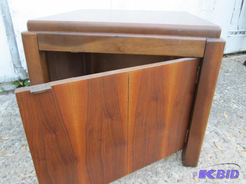 lot 201 image: Nice solid wood end table with door cubby und...