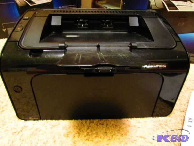 lot 204 image: HP Professional Laserjet printer, P1100...