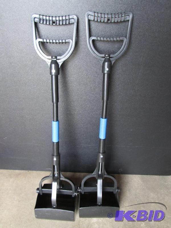 lot 25 image: Pair of pet waste scoopers...