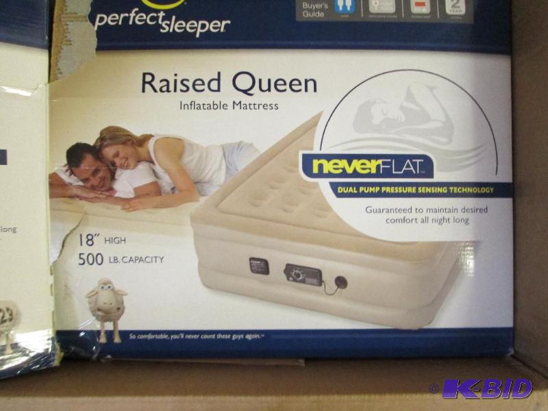 lot 55 image: Serta raised queen inflatable mattress...