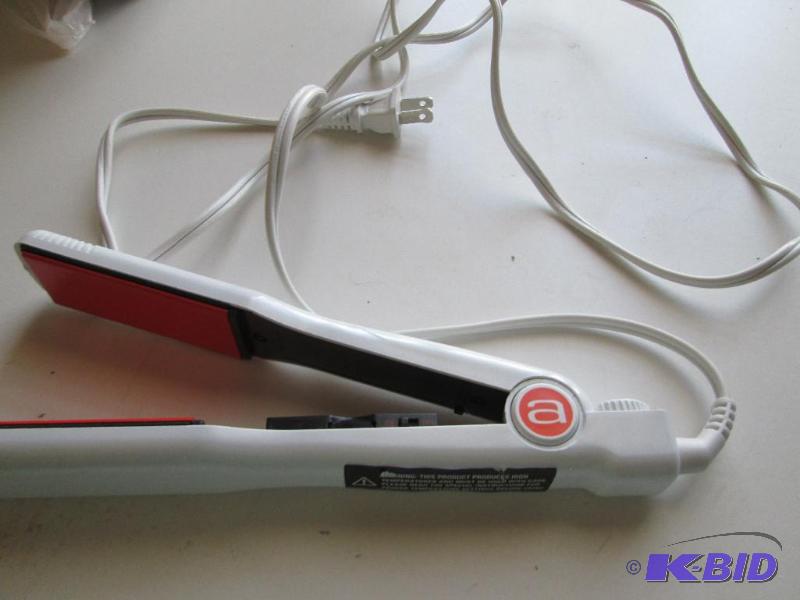 lot 62 image: Hair iron...