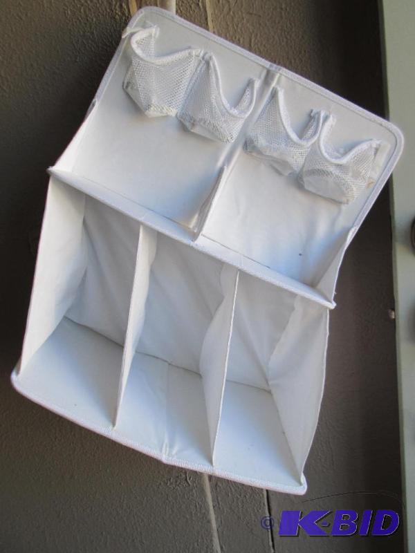 lot 63 image: Closet organizer with velcro hangers...