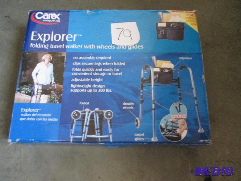 lot 79 image: Carex folding walker with wheels and glides...