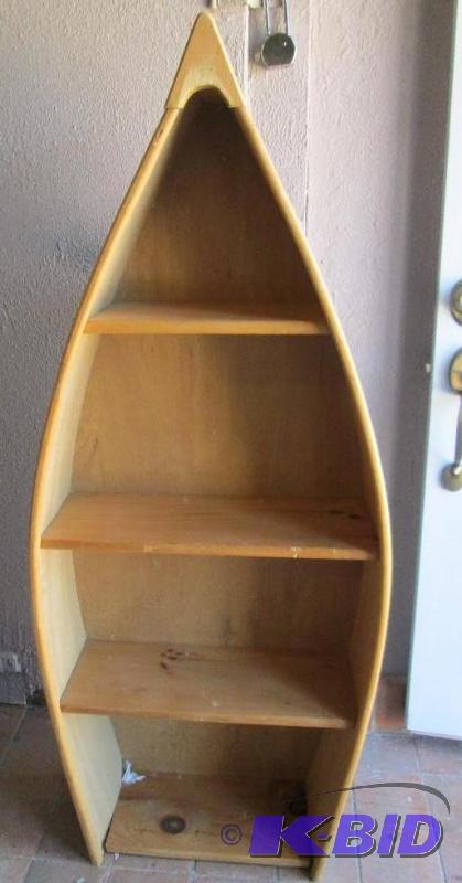 lot 87 image: Canoe shaped book case or wall hanging shadow...