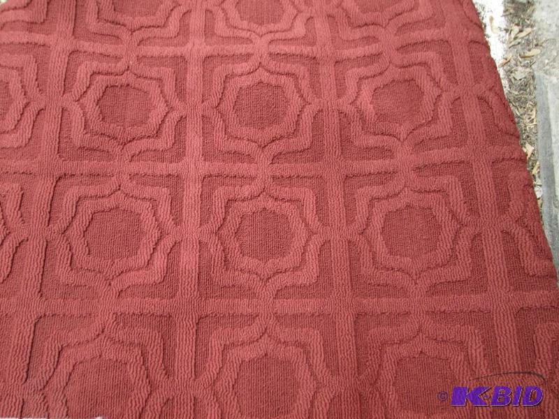 lot 9 image: 5 x 7 foot area rug...