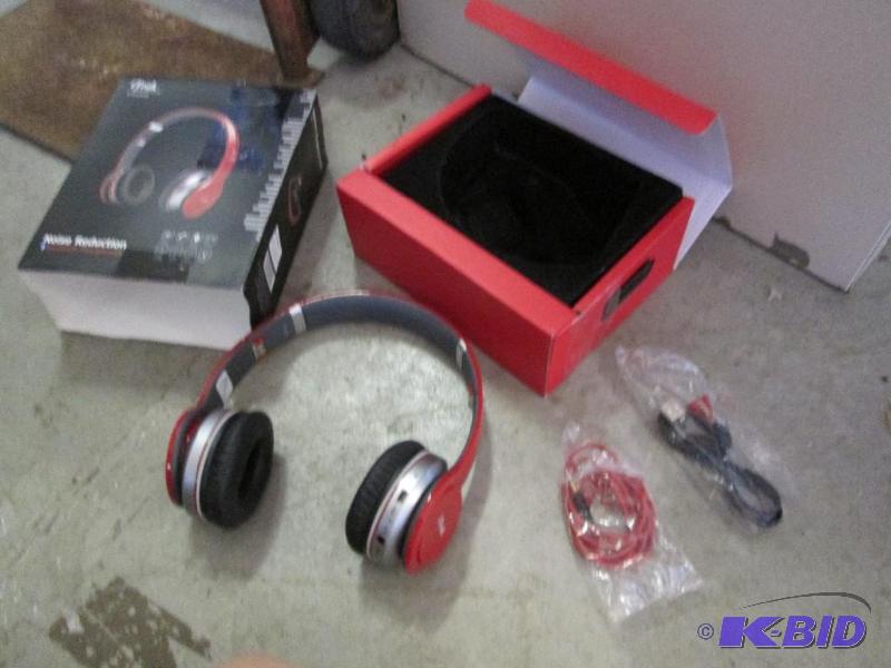 lot 98 image: I Track noise reduction bluetooth headphones...