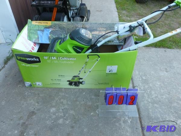 lot 2 image: Greenworks electric 120 volt 8 amp cultivator...