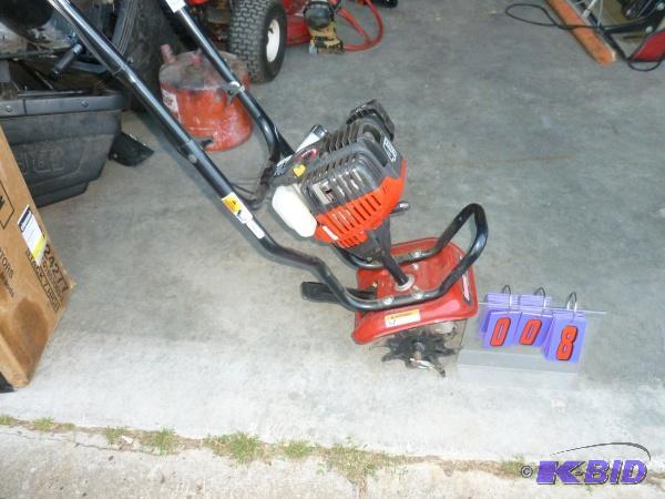 lot 8 image: Craftsman 4 cycle minor tiller. Runs and work...