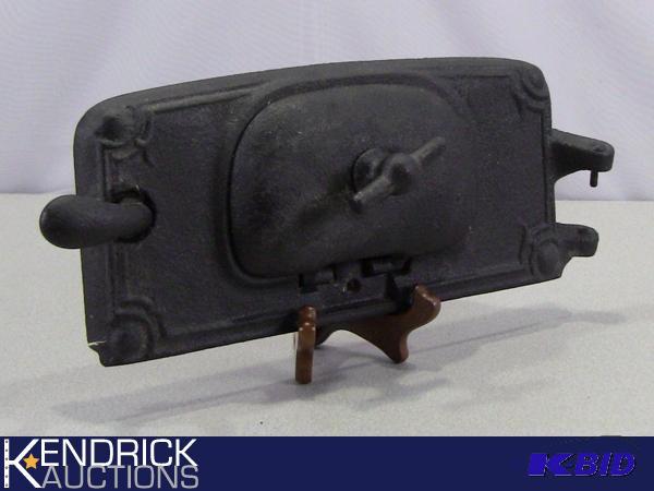 lot 14 image: Unique Antique Cast Iron Stove Piece