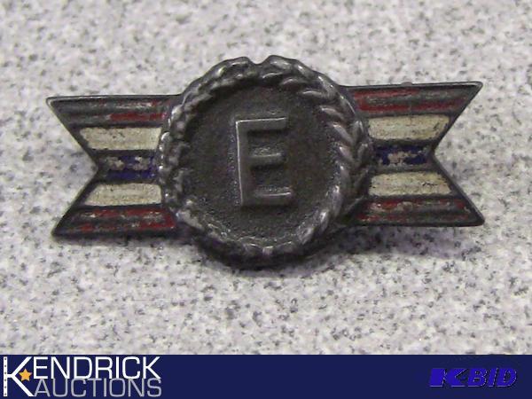 lot 35 image: Vintage Sterling Silver Army Navy Production Award E Pin