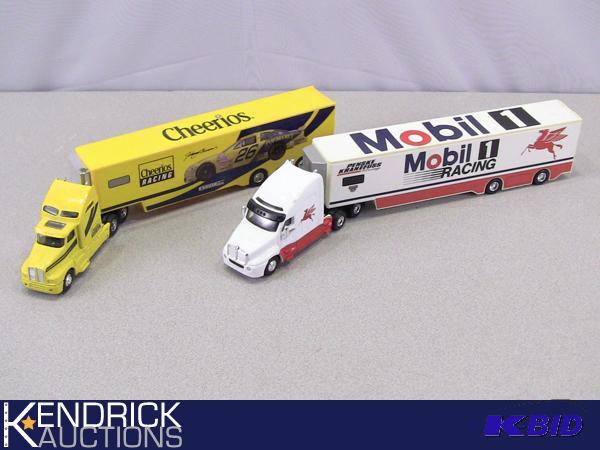 lot 54 image: 2 Mint Condition Hot Wheels, and Racing Champions Die Cast Race Car Transporter Trucks