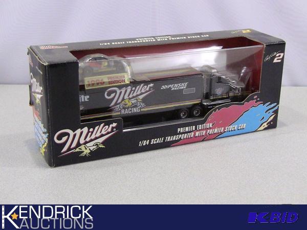lot 55 image: New in Package Racing Champions Miller Die Cast Transporter with Premier Stock Car