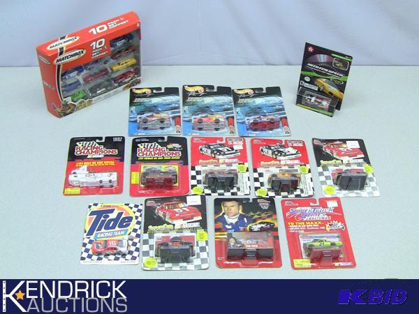 lot 67 image: Lot of Various New in Package Hot Wheels, Matchbox, and Racing Champions Die Cast Cars