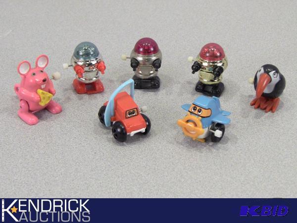 lot 71 image: Lot of 7 Collectible Vintage 1977 Tomy Wind Up Toys