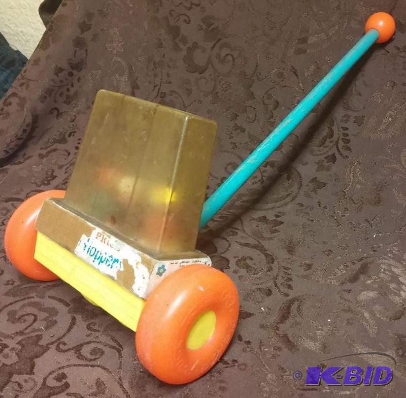 lot 13 image: Fisher Price 1970s Happy Hopper Push...