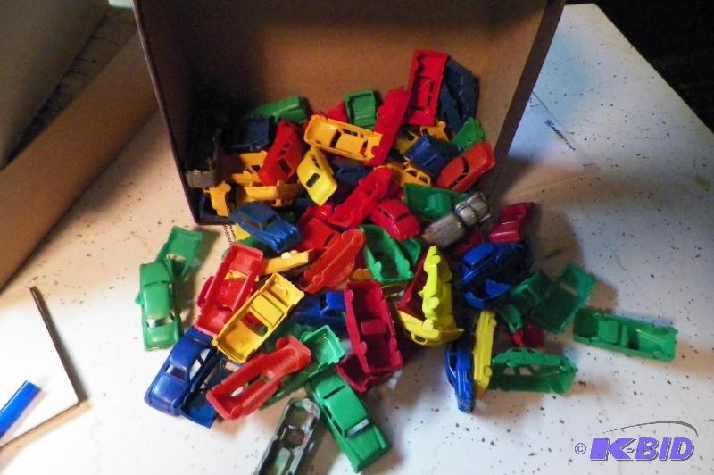 Box of Plastic Toy Cars