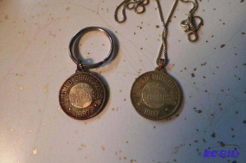 One Minnesota Twins sterling silver keychain and one Minnesota Twins sterling silver necklace
