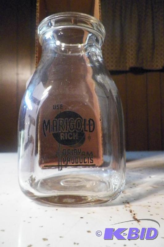Marigold 4 12 inch cream bottle