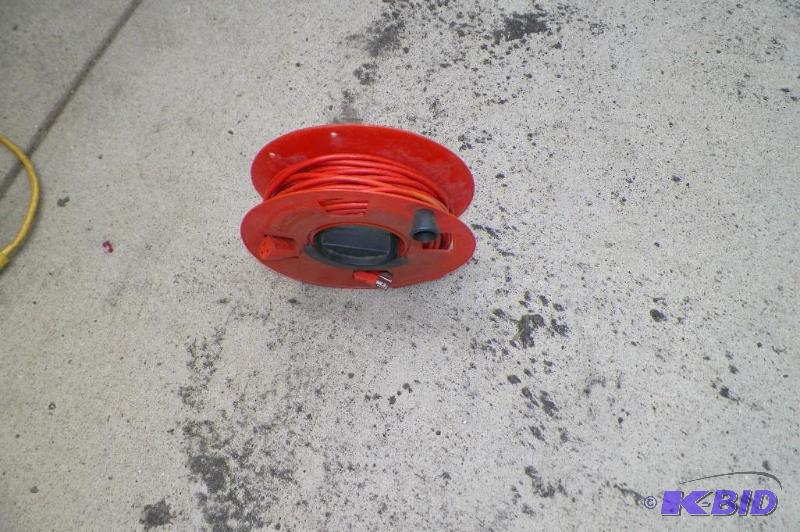 lot 220 image: Orange Extension Cord on Reel