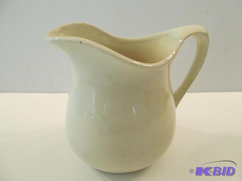 lot 48 image: Antique water pitcher